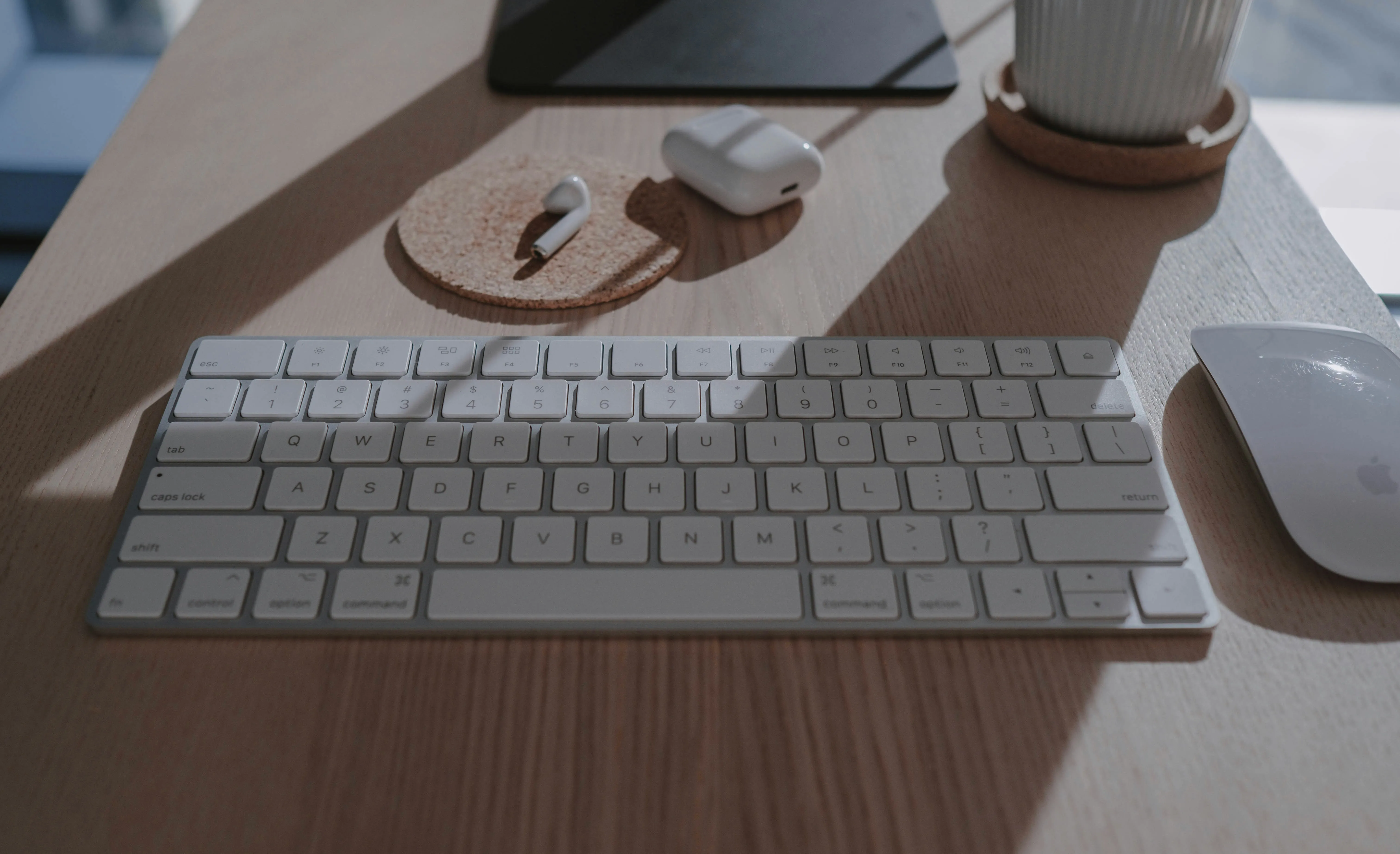 JavaScript Bundlers - silver apple keyboard on brown wooden table